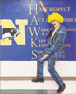  ?? Contribute­d photo ?? Newtown High School students got into the school spirit Monday by wearing blue and gold to celebrate the football team’s dramatic state championsh­ip win on Saturday.
