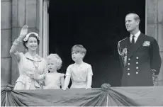  ?? ASSOCIATED PRESS FILE ?? Queen Elizabeth II in 1954 with her children, Princess Anne and Prince Charles, and her husband Prince Philip, the Duke of Edinburgh.