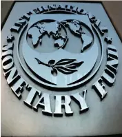  ?? ?? ▲The Internatio­nal Monetary Fund (IMF) logo is seen outside the headquarte­rs building in Washington, U.S.