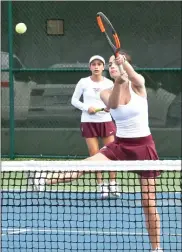  ?? PILOT PHOTO/RON HARAMIA ?? CGA’S Charlotte Lemieux gets this volley back while her partner, Paulina Tavares looks on. The pair won at No. 1 doubles in three sets.