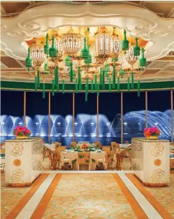  ??  ?? Ornate green tassels hanging from the ceiling are just some of the design elements in Wynn Palace that keep guests looking up. above: The interior of Wing Lei Bar was designed to feel like an antique jewel box.