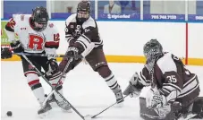  ?? CLIFFORD SKARSTEDT METROLAND FILE PHOTO ?? The U16 AAA Petes, pictured battling in the Steve Richey Memorial Tournament in January, have clinched a berth in the OHL Cup Showcase Tournament quarterfin­als after a 5-4 OT win over Ottawa.