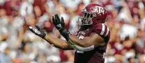  ?? Godofredo A. Vásquez / Staff photograph­er ?? Justin Madubuike, who made 11 sacks in two years as a defensive tackle, would be Texas A&M’s first first-round pick since 2017.