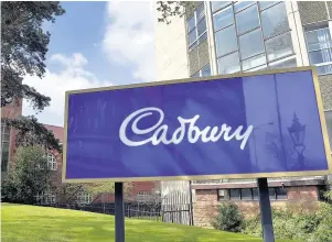  ??  ?? > Cadbury’s factory in Bournville and (below) A Dairy Milk Tiffin bar