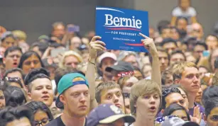  ?? JIM WILSON/NEW YORK TIMES FILE PHOTO ?? Supporters during a campaign event for Sen. Bernie Sanders, a Democratic presidenti­al hopeful, in 2016 in Modesto, Calif. The party is looking at changes to superdeleg­ates, a point of contention during the last presidenti­al campaign.