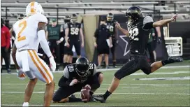  ?? GEORGE WALKER IV — THE TENNESSEAN VIA AP ?? Vanderbilt’s Sarah Fuller (32) kicks an extra point against Tennessee at Vanderbilt Stadium on Saturday in Nashville, Tenn.