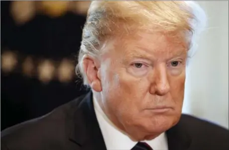  ?? JACQUELYN MARTIN — THE ASSOCIATED PRESS ?? President Donald Trump attends a discussion on border security with local leaders on Friday in the Cabinet Room of the White House.