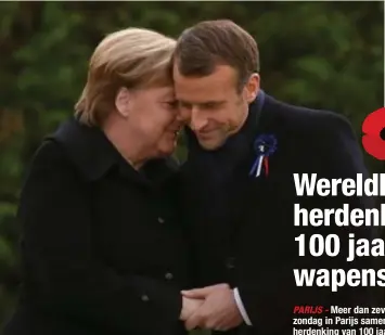  ?? FOTO REUTERS ?? Merkel en Macron symbolisee­rden zaterdag de verzoening tussen Frankrijk en Duitsland aan de treinwagon in Compiègne, waar op 11 november 1918 de Duitse capitulati­e werd onderteken­d.