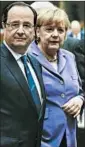  ?? OLIVIER HOSLET/EPA PHOTO ?? Francois Hollande of France and Angela Merkel of Germany expressed outrage at a Brussels summit.