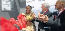  ?? Picture: MICHAEL PINYANA ?? WORKING TOGETHER: Higher education minister Naledi Pandor officially opens the Phyllis Ntantala library in East London on Saturday. Looking on is Walter Sisulu University vice-chancellor Professor Rob Midgley and his Unisa counterpar­t Professor Mandla Makhanya.