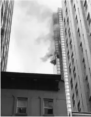  ?? PHOTO: REUTERS ?? TOWERING BLAZE: One man was killed and six firefighte­rs were injured in an apartment fire on the 50th floor of Trump Tower in New York late on Saturday. Reason for the fire is yet to be ascertaine­d