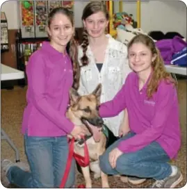  ??  ?? From left, sisters Sydney Sherman, 16, Danielle Sherman, 18 and Jacqueline Sherman, 14 with Glory, the puppy they raised for The Seeing Eye, Inc.