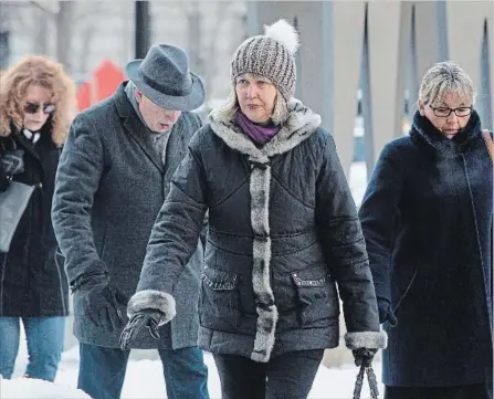  ?? CHRIS YOUNG THE CANADIAN PRESS ?? Linda Babcock, second from right, mother of Laura Babcock, arrives at a Toronto courthouse for the sentencing of Dellen Millard and Mark Smich.