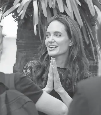  ?? HENG SINITH, AP ?? Angelina Jolie may star in a movie adaptation of Shoot Like a Girl, Mary Jennings Hegar’s memoir of her service in the Air Force and Air National Guard.