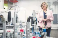  ?? CHRIS YOUNG/THE CANADIAN PRESS ?? NDP Leader Andrea Horwath visits a mechatroni­cs lab during a campaign stop at Seneca College on Wednesday.