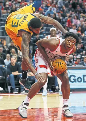  ?? RICK MADONIK TORONTO STAR FILE PHOTO ?? The Raptors used late picks or post-draft deals to land OG Anunoby (ducking Indiana’s Royce O’Neale above), Pascal Siakam (top left) and Fred VanVleet.