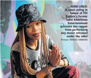  ?? Picture: TSHEKO KABASIA ?? HARD LINES: A court ruling in favour of Fifi Cooper’s former label Ambitiouz Entertainm­ent prevents the rapper from performing any music released under the label