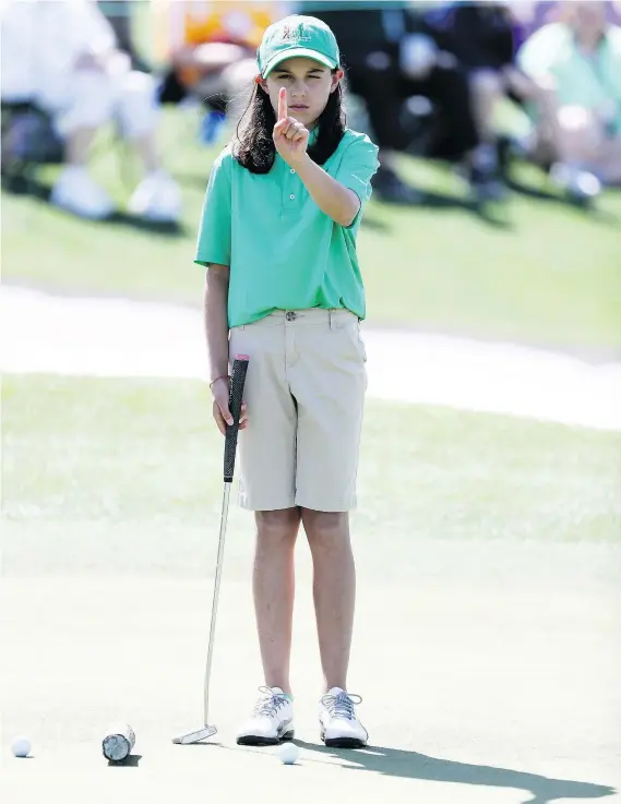  ?? — GETTY IMAGES FILES ?? Vanessa Borovilos, 11, competes at the Drive, Chip & Putt Championsh­ip on Sunday at Augusta National Golf Club.