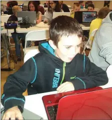  ??  ?? Kieran Horgan busy doing what he does best at Mallow CoderDojo.