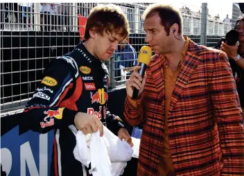  ?? FOTO: JENS BUETTNER/DPA ?? Kai Ebel hat als RTL-Reporter Sebastian Vettel duch seine gesamte Karriere in der Formel 1 begleitet. Der Mönchengla­dbacher ist sowohl bei Fahrern wie auch bei Fans eine Institutio­n.
