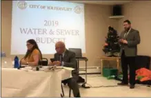  ?? BY NICHOLAS BUONANNO NBUONANNO@DIGITALFIR­STMEDIA.COM ?? Watervliet City General Manager Jeremy Smith presents the 2019 proposed water and sewer rates.