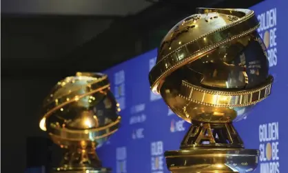  ?? Photograph: Chris Pizzello/Invision/AP ?? ‘A thundering disgrace’ … replicas of Golden Globe statues.