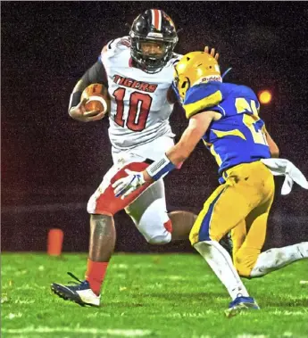  ?? Christian Snyder/Post-Gazette ?? As Derry Area defender Justin Huss found out last season, Beaver Falls’ Josh Hough is a bruising running back with deceptive speed.