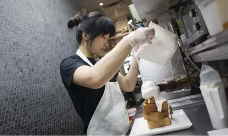  ?? ANNE-MARIE JACKSON PHOTOS/TORONTO STAR ?? Petit Potato, which opened last February at Finch Ave. and Leslie St., has brought the toast trend from Asia to Toronto.