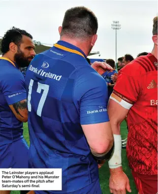  ??  ?? The Leinster players applaud Peter O’Mahony and his Munster team-mates off the pitch after Saturday’s semi-final