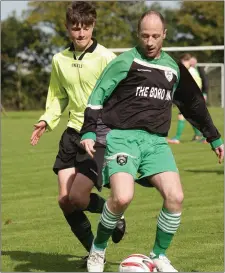  ??  ?? Cian O’Connor of Crossabeg puts pressure on Willie Murphy.