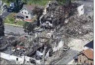  ?? AP/Wisconsin State Journal/JOHN HART ?? The site of natural gas explosion that killed a firefighte­r in SunPrairie, Wis., is seen from the air Wednesday.