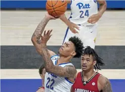  ?? Pittsburgh Post-Gazette ?? Pitt guard Nike Sibande, who averaged 6.9 points and 3.0 rebounds for the Panthers last season, is one of 15 student-athletes to establish an NIL deal with Dunkin’.