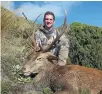  ?? SUPPLIED/ZANE MIRFIN ?? Baxter Roberson, of San Francisco, with a red stag he shot during a West Coast hunt in April 2016.