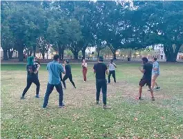  ?? LIGHTUP SHOEBOX ?? Participan­ts in a March Play Date program from Lightup Shoebox learn about stage combat in Orlando’s Loch Haven Park.