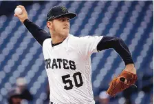  ?? GENE J. PUSKAR/ASSOCIATED PRESS FILE ?? Jameson Taillon, seen here pitching for the Pittsburgh Pirates in April of 2019, has been acquired by the New York Yankees for four prospects, a person familiar with the trade talks tells the AP.