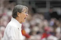  ?? AP photo ?? Stanford coach Tara VanDerveer yells during the first half of the Cardinal’s 65-56 win over Oregon State on Sunday. The win was the record-setting 1,203rd of VanDerveer’s career.