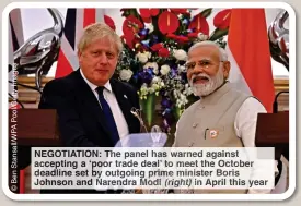  ?? ?? NEGOTIATIO­N: The panel has warned against accepting a ‘poo trad deal to ee the October de ine set outgoing rime inister Boris Jo Narendra od (right) in April this ar