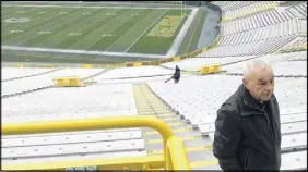  ?? AP Photo ?? Patrick Webb, executive director of the Green Bay/brown County Profession­al Football Stadium District, recalls watching a game known as the “Ice Bowl,” at Lambeau Field in Green Bay, Wis.