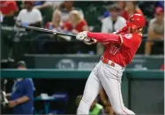  ?? BY RAY CARLIN ?? AP FILE PHOTO In this Sept. 5, photo, Los Angeles Angels’ Shohei Ohtani follows through on a two-run home run against the Texas Rangers during the eighth inning of a baseball game in Arlington, Texas.