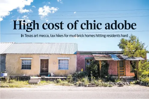  ?? PHOTOS BY SARAH M VASQUEZ/NEW YORK TIMES ?? Two recently renovated adobe homes, in Marfa, Texas. Officials in this artsy outpost in the West Texas desert have raised taxes on adobe homes, pinching upscale homeowners as well as lower-income families who have lived there for decades.