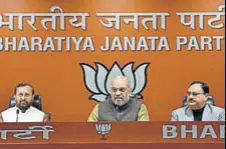  ?? SANCHIT KHANNA/HT PHOTO ?? BJP president Amit Shah and other party leaders during a press conference after the Rafale deal judgment by the Supreme Court, at the BJP headquarte­rs in New Delhi on Friday.