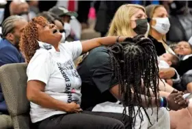  ?? AP PHOTO/GERRY BROOME ?? Family members react during the funeral for Andrew Brown Jr. on Monday at Fountain of Life Church in Elizabeth City, N.C.