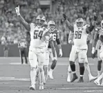  ?? IMAGES
STACY REVERE/GETTY ?? Lions defensive lineman Alim McNeill celebrates a defensive stop against the Packers last Thursday.