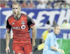  ?? THE ASSOCIATED PRESS FILES ?? 111 90
Toronto FC midfielder Benoit Cheyrou celebrates after scoring against the New York Red Bulls in May. Cheyrou, 36, announced his retirement on Thursday, but will continue with the club in an academy coaching role.