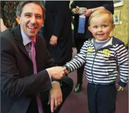  ??  ?? Minister Simon Harris meets Patrick Molloy, who was there to see his grandad Tadhg Twomey’s work.