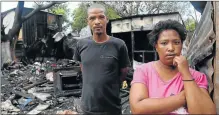  ?? Picture: SIBONGILE NGALWA ?? ALL GONE: The homes and belongings of Edwin King and Berylene Masimla were destroyed in a fire early on Thursday in Parkside