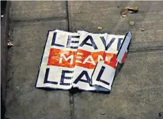  ??  ?? Due notice: a crumpled ‘Leave Means Leave’ poster lies discarded outside Parliament