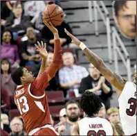  ?? Spurs and Feathers/ALLEN SHARPE ?? Arkansas sophomore guard Mason Jones (13), who had 15 points in Saturday’s 77-65 loss to South Carolina, said the Razorbacks “just got to keep at it. Keep pushing, keep fighting. We’re going to get there.”