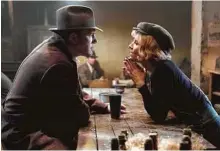  ?? Warner Bros. Entertainm­ent ?? Ben Affeck and Sienna Miller star in “Live by Night.”