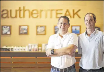  ??  ?? Damon Fogel (left) and Eric Brenner are the owners of AuthenTeak, an outdoor furniture and accessorie­s store in West Midtown.